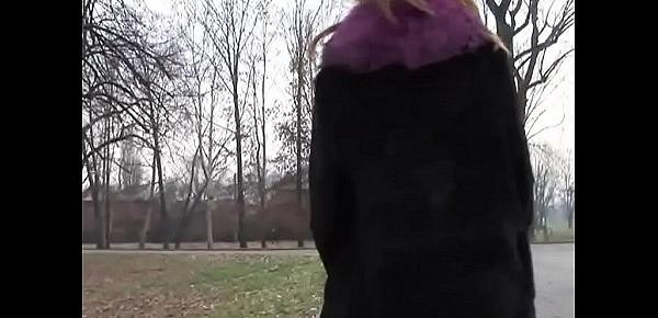  Stunning milf with nice tits flashing in a park
